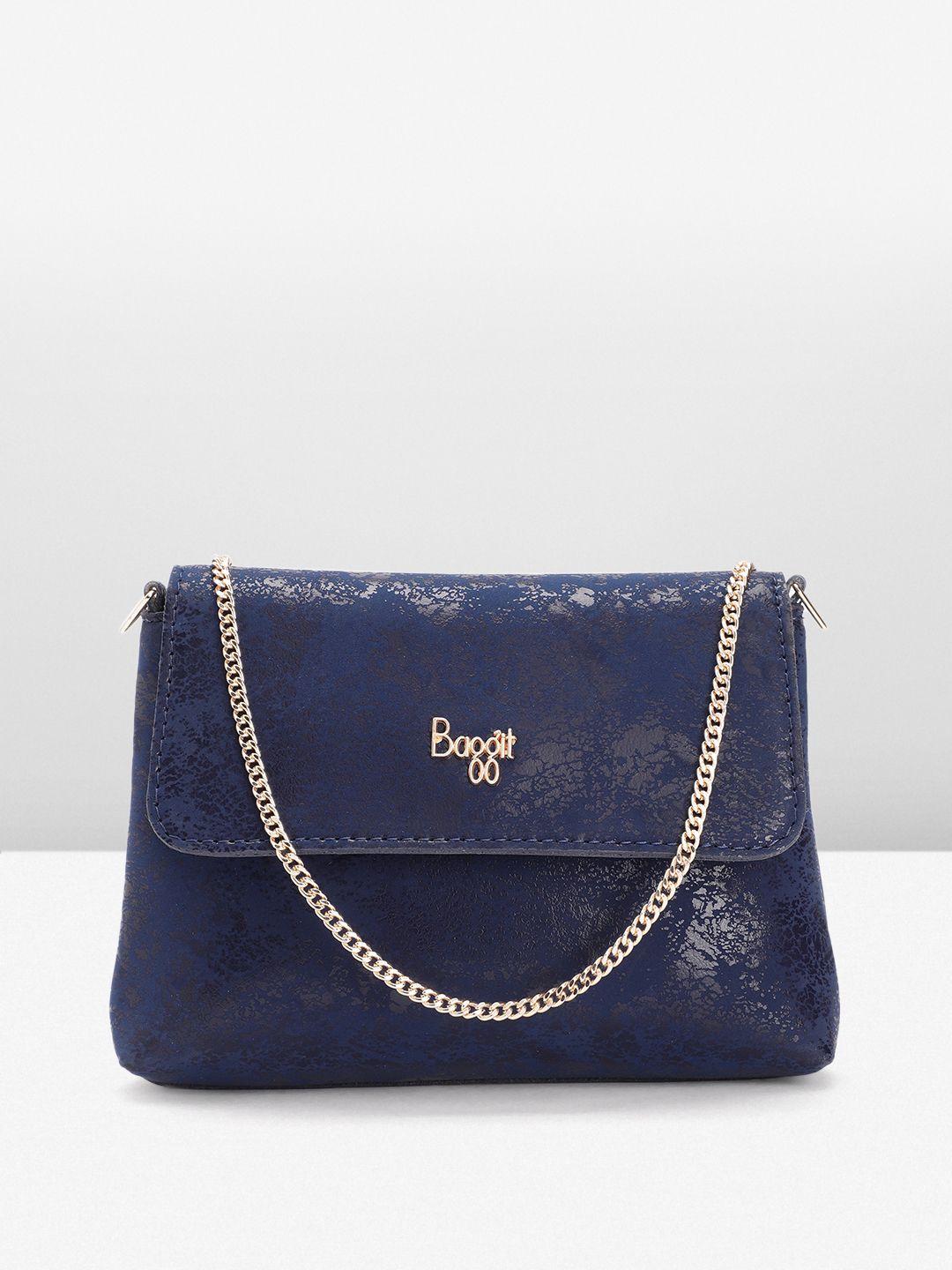 baggit textured foldover clutch with detachable strap