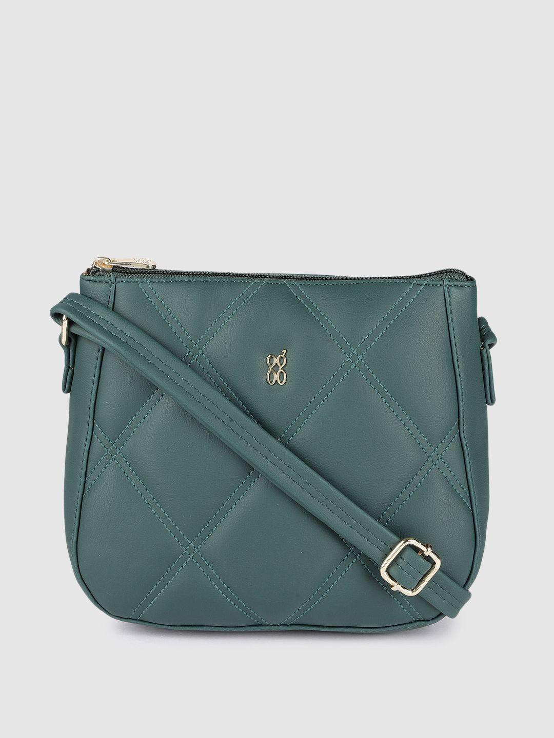 baggit women green quilted sling bag