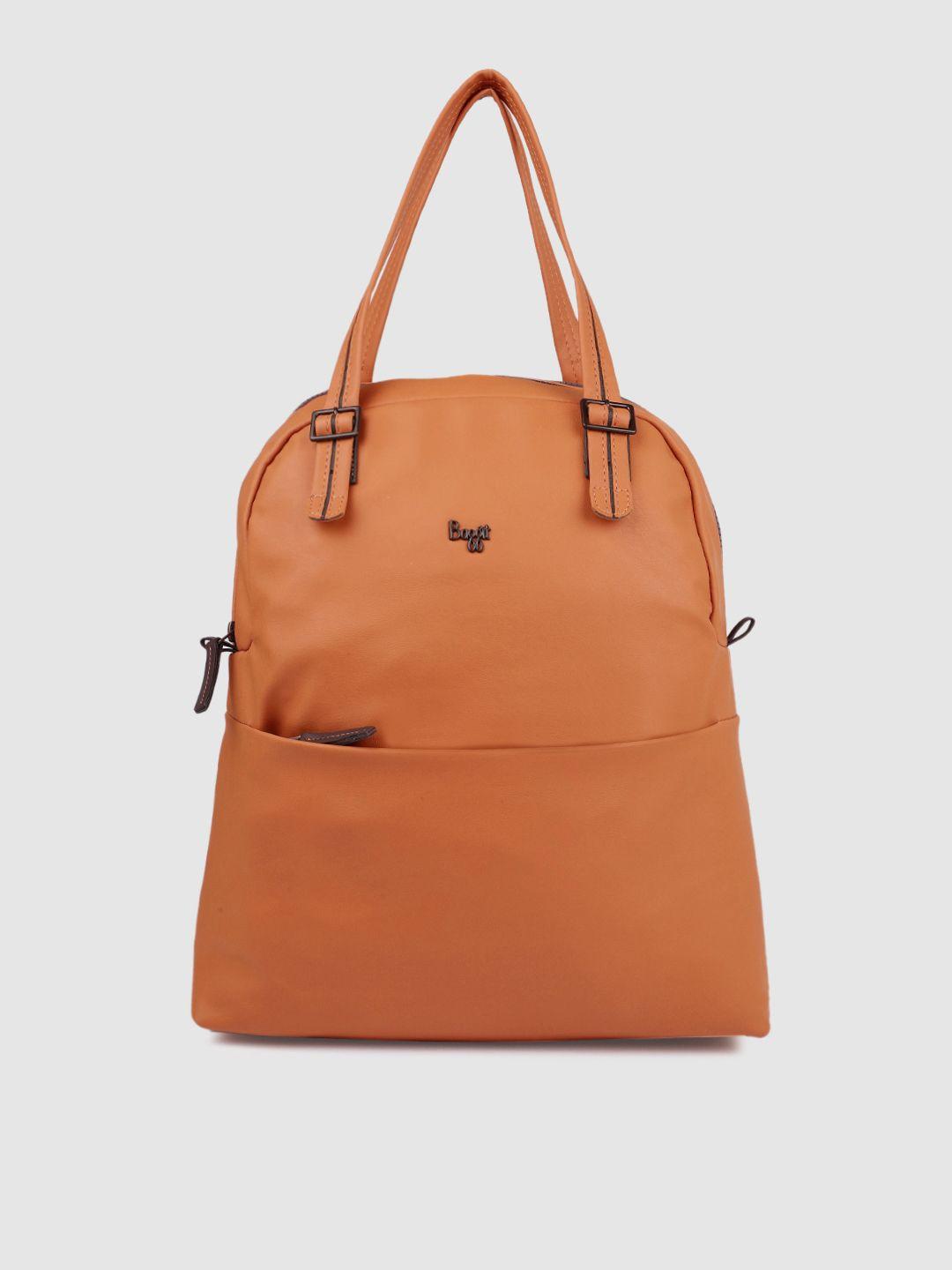 baggit women orange solid auplin backpack