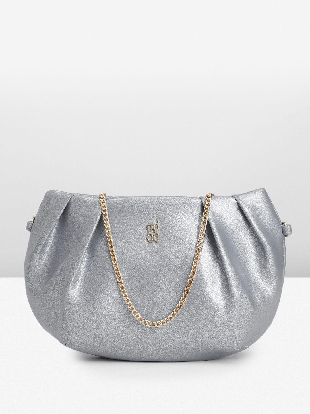 baggit women solid purse clutch