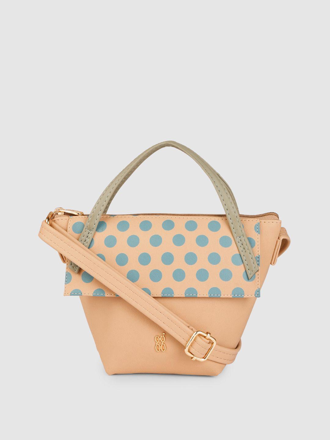 baggit beige & blue solid regular structured handheld bag with polka dots print applique