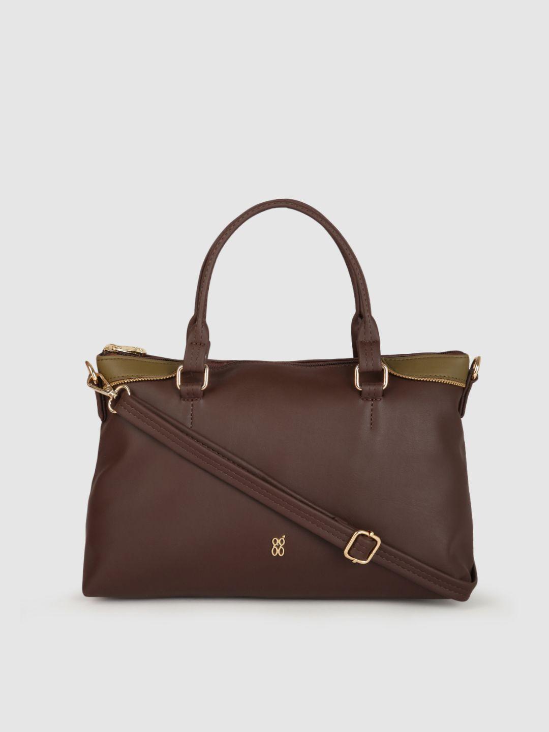 baggit brown solid handheld bag