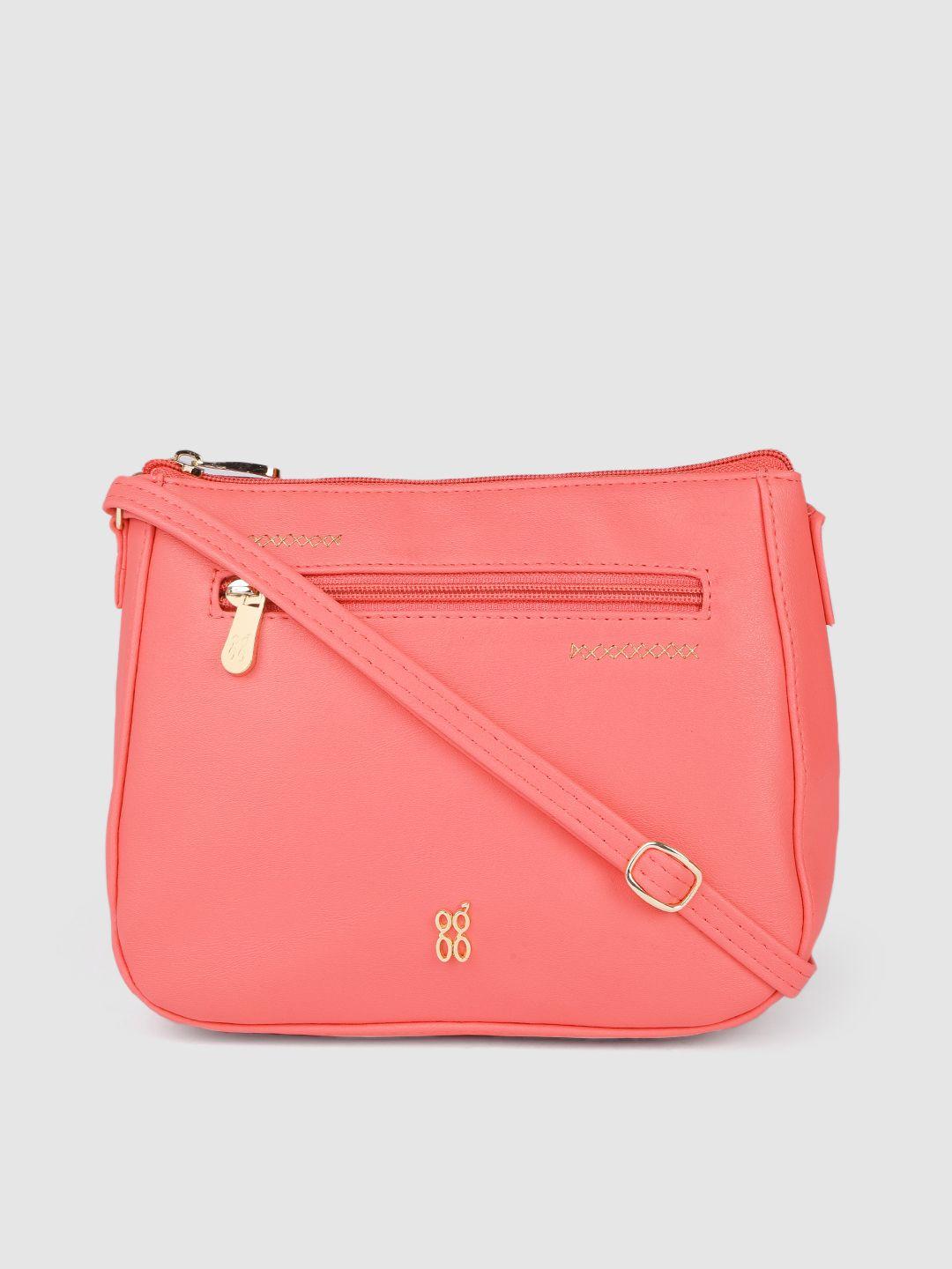 baggit coral pink structured sling bag