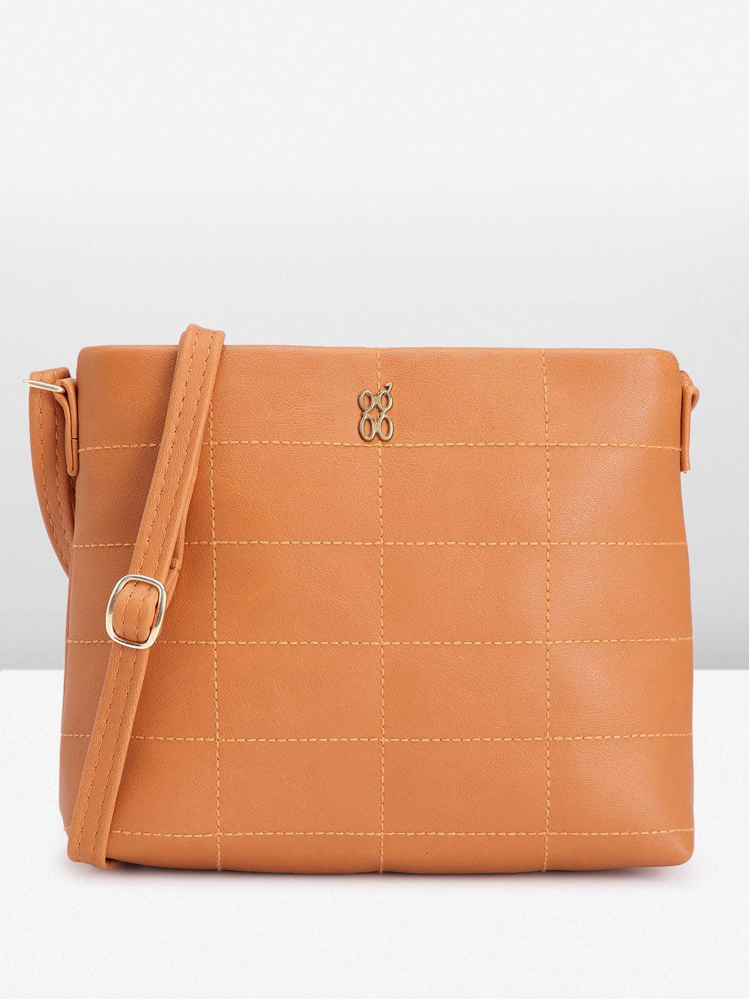 baggit geometric textured sling bag