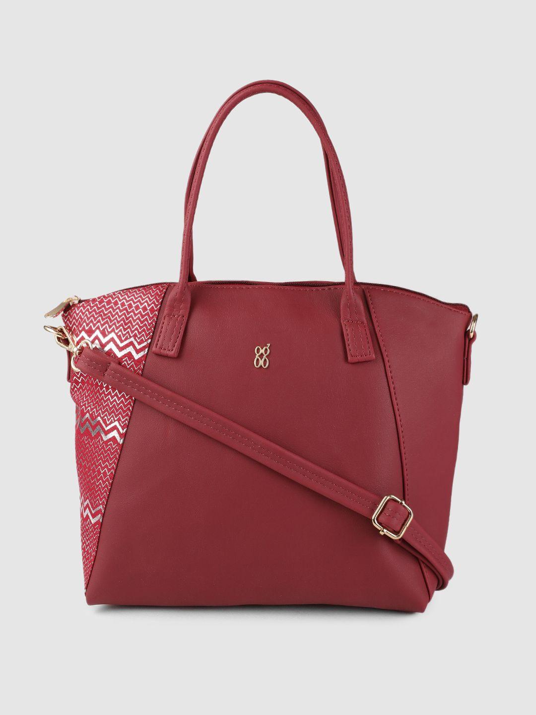 baggit maroon solid regular structured shoulder bag with woven & chevron print detail