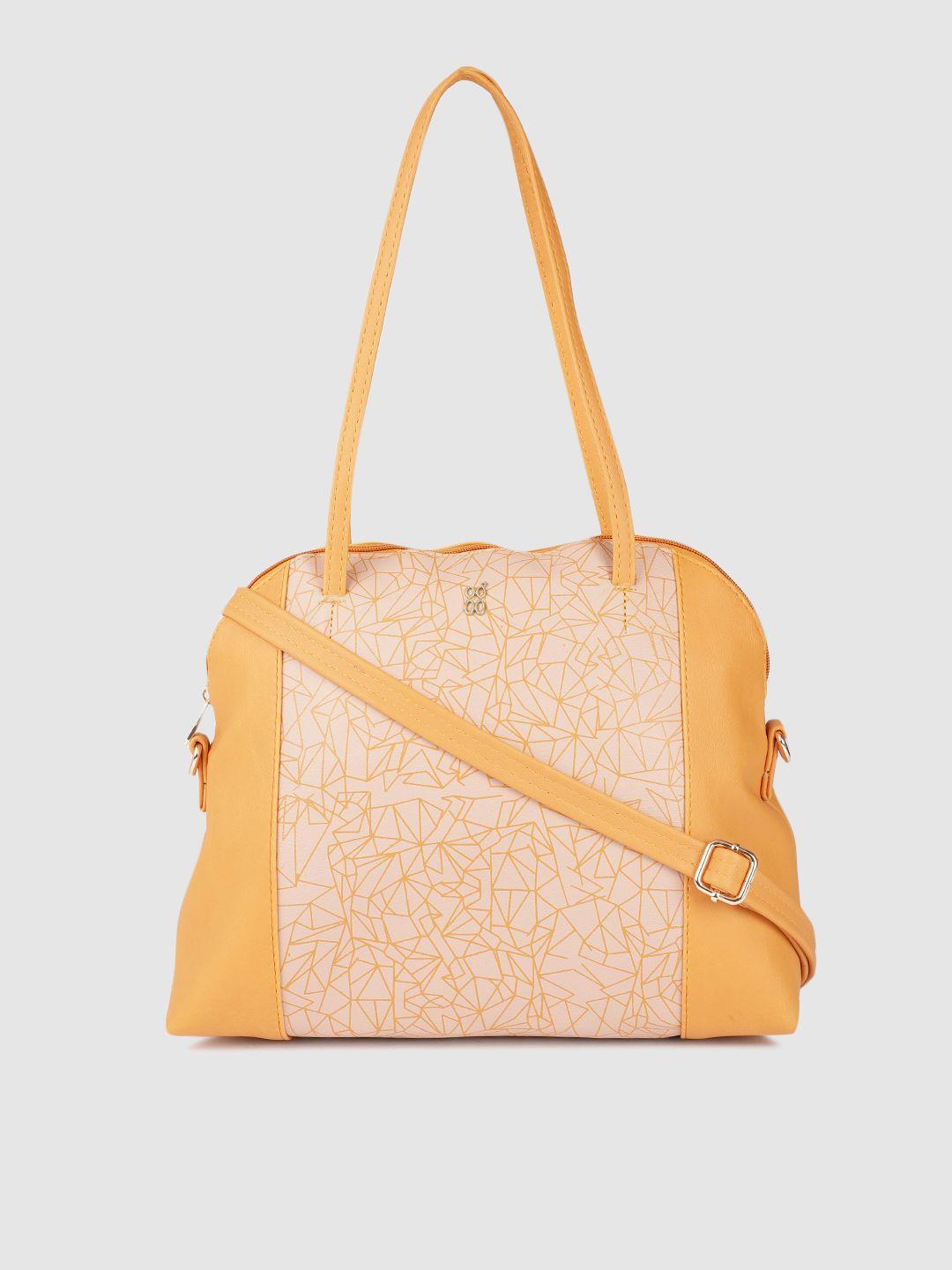 baggit mustard yellow geometric printed structured shoulder bag