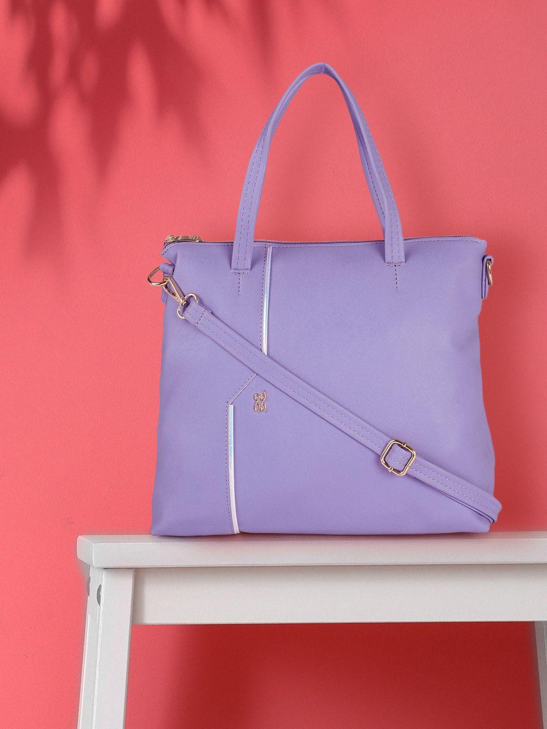 baggit purple solid structured handheld bag