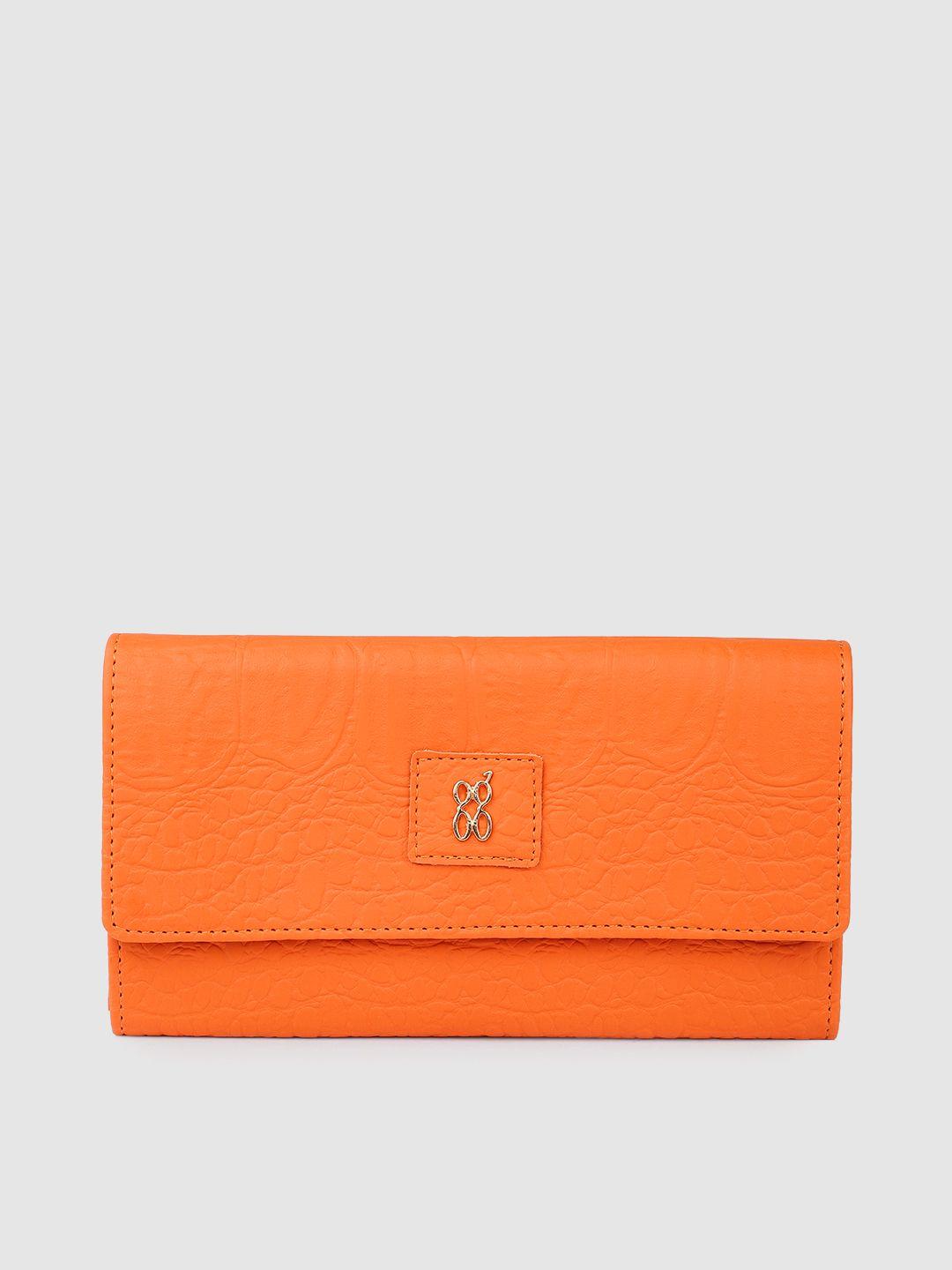 baggit women animal textured pu envelope wallet