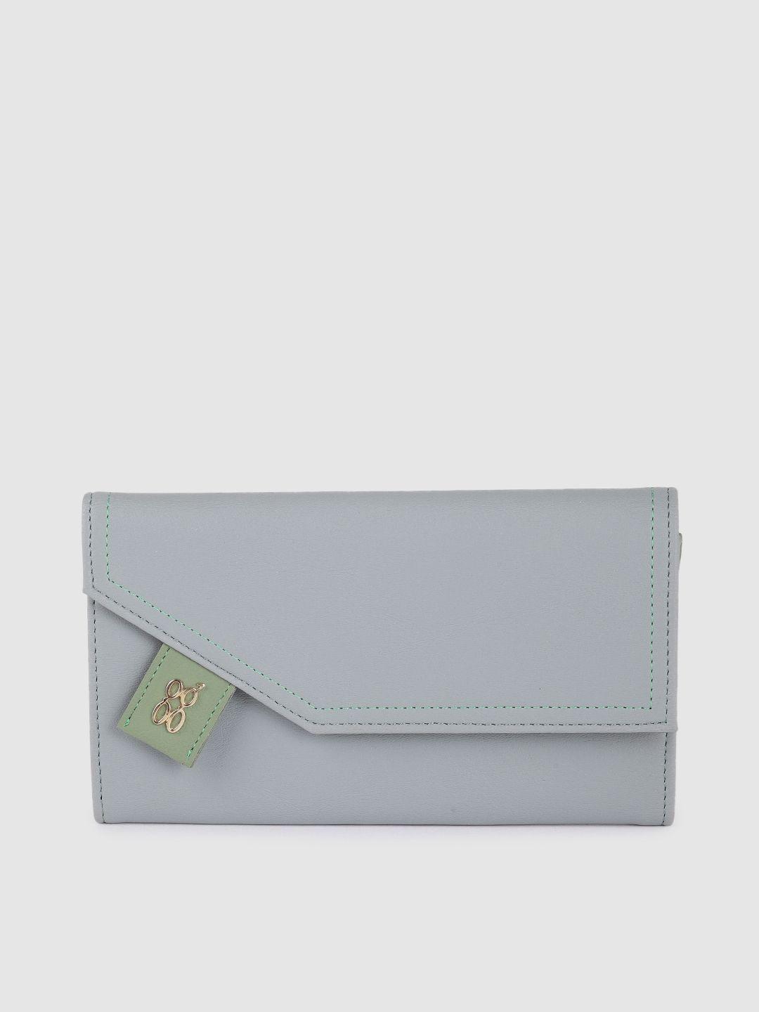 baggit women blue solid synthetic two fold wallet