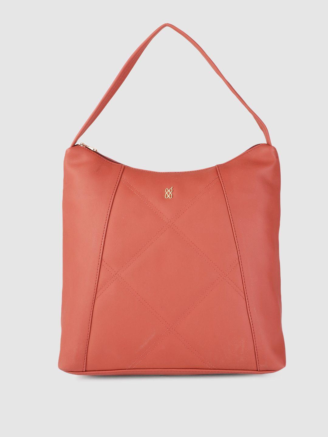 baggit women coral pink solid hobo bag