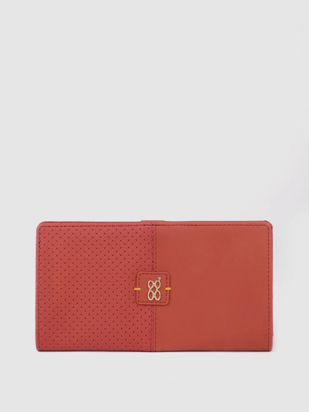 baggit women coral pink two fold wallet