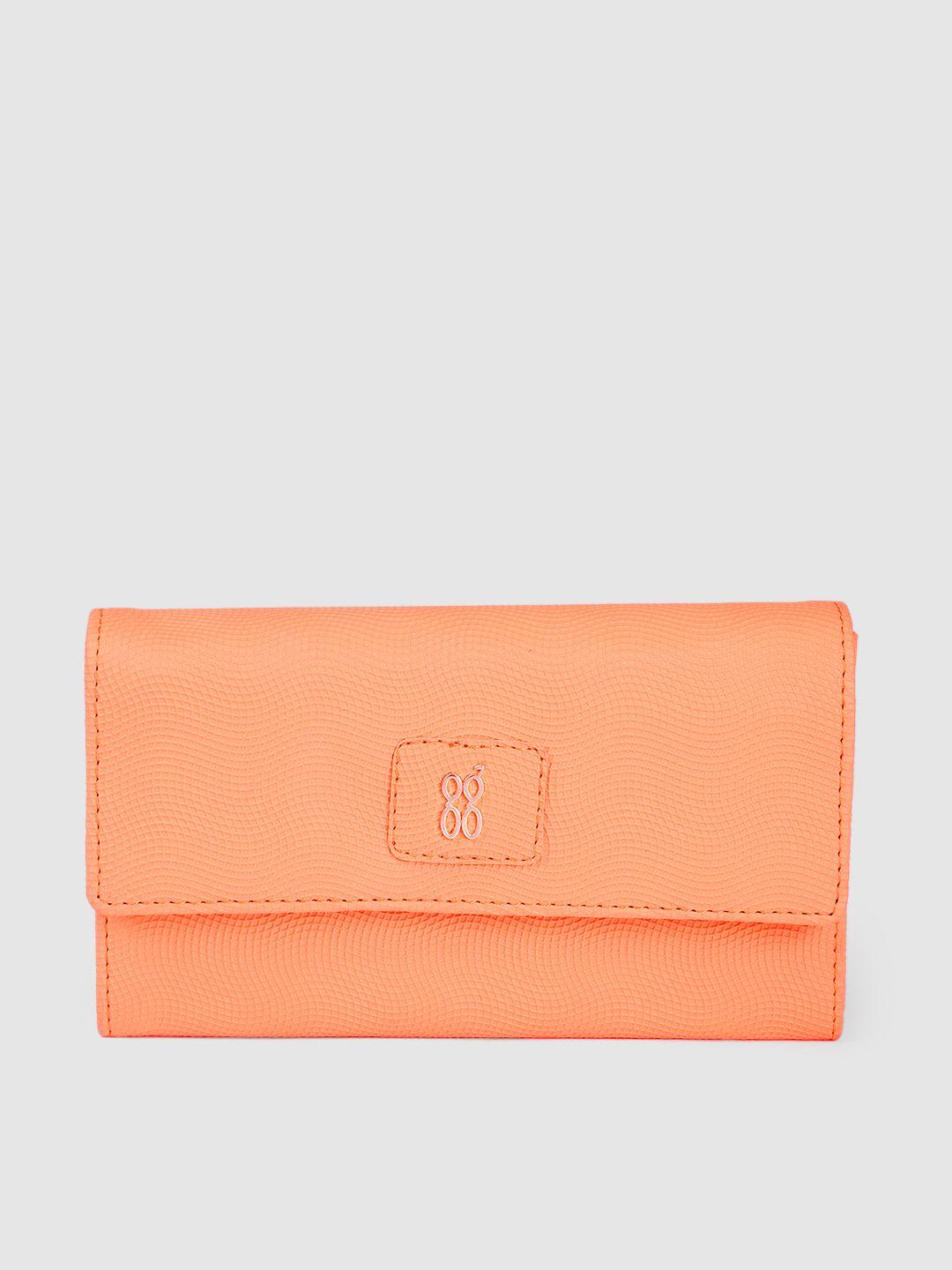 baggit women geometric textured pu envelope wallet