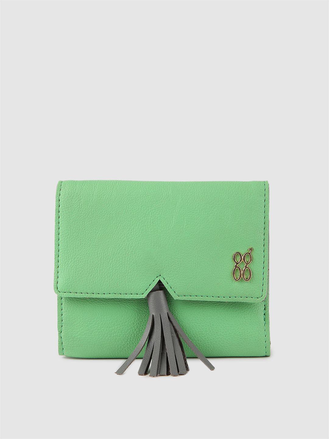 baggit women green solid three fold wallet