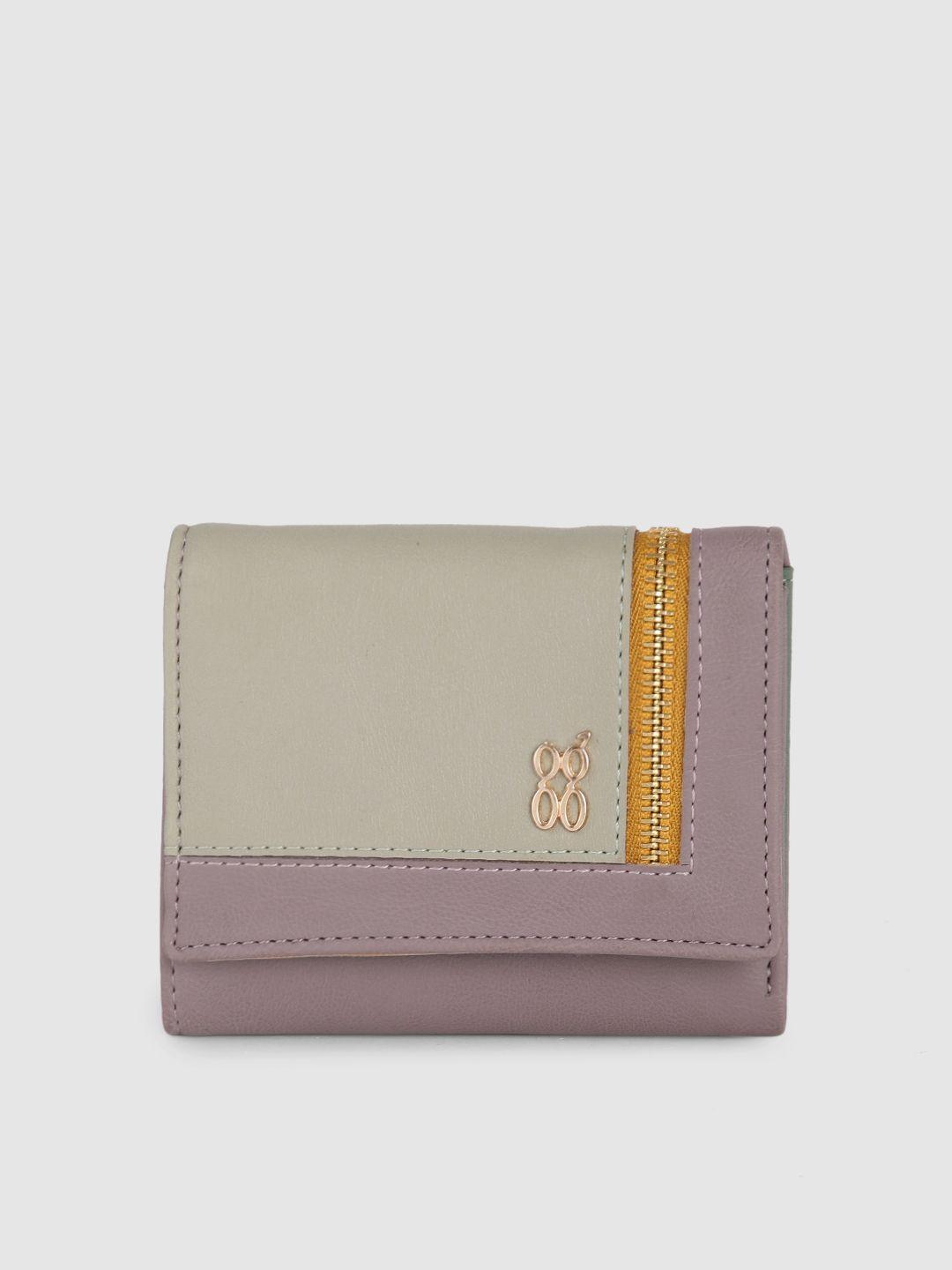 baggit women mauve purple & mint green solid zip detail three fold wallet