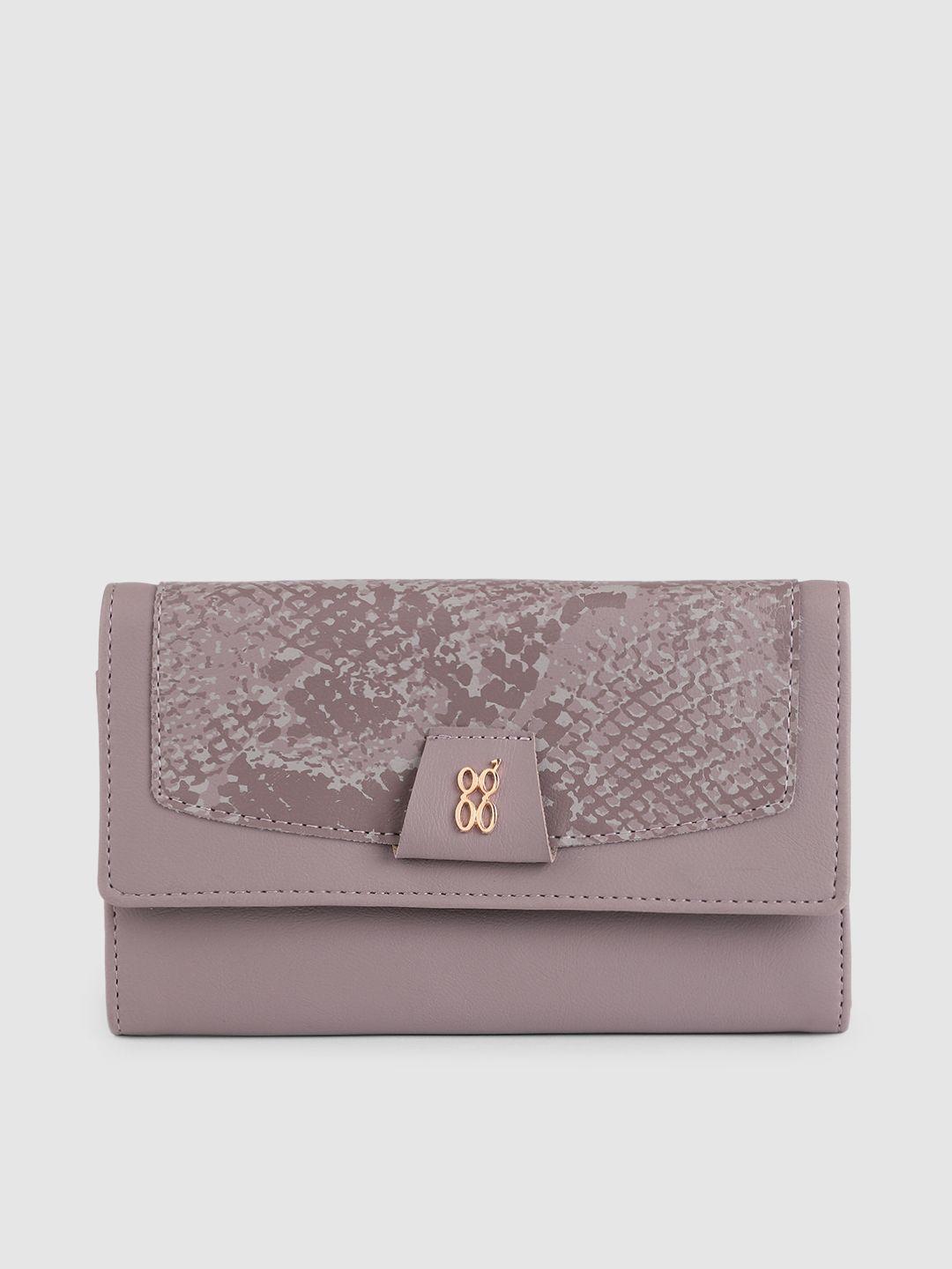 baggit women mauve solid applique three fold wallet