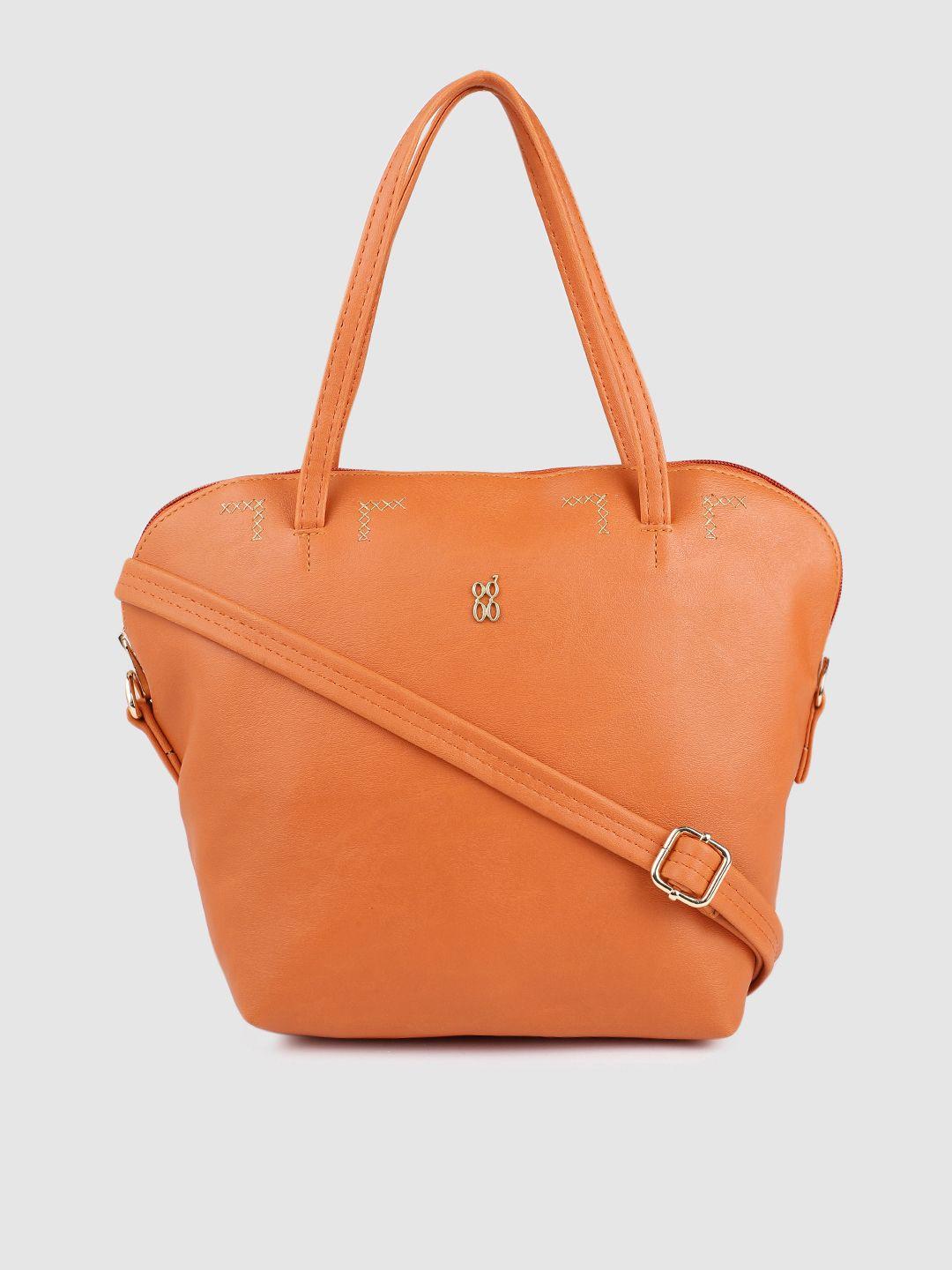 baggit women orange solid structured handheld bag