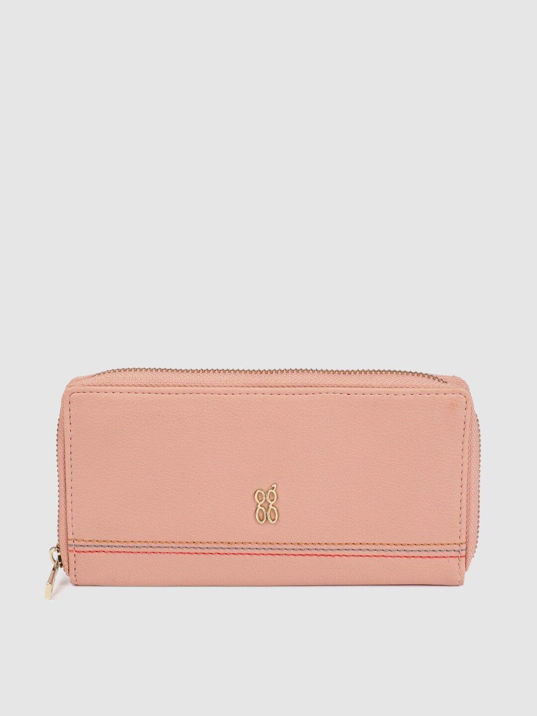 baggit women peach-coloured solid lemon lark zip around wallet