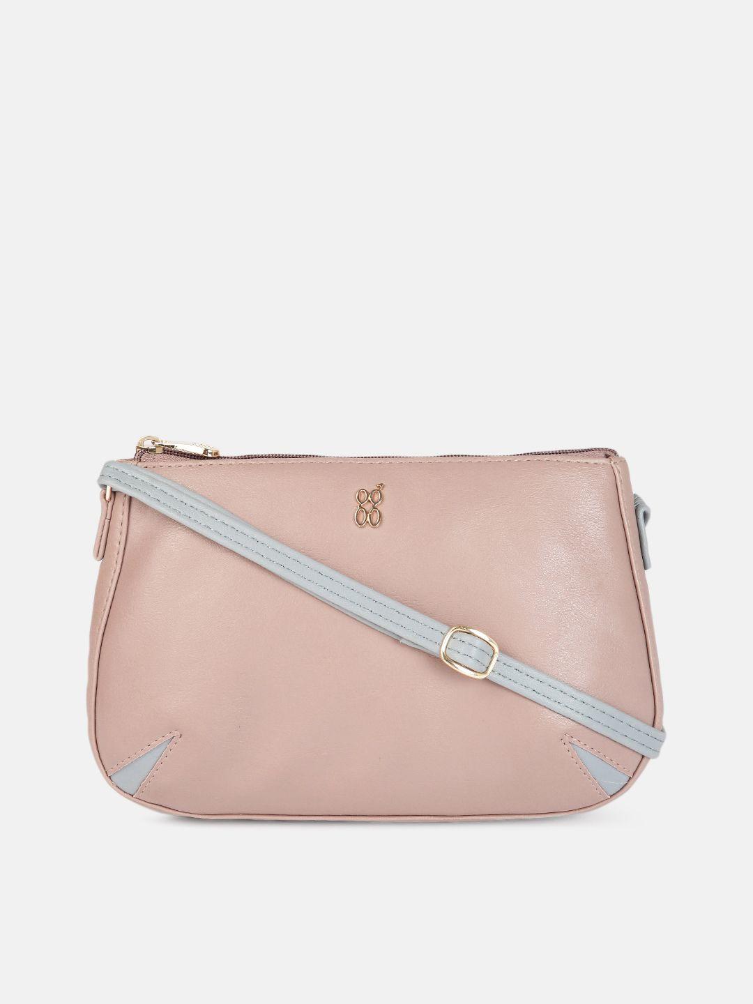 baggit women pink solid sling bag