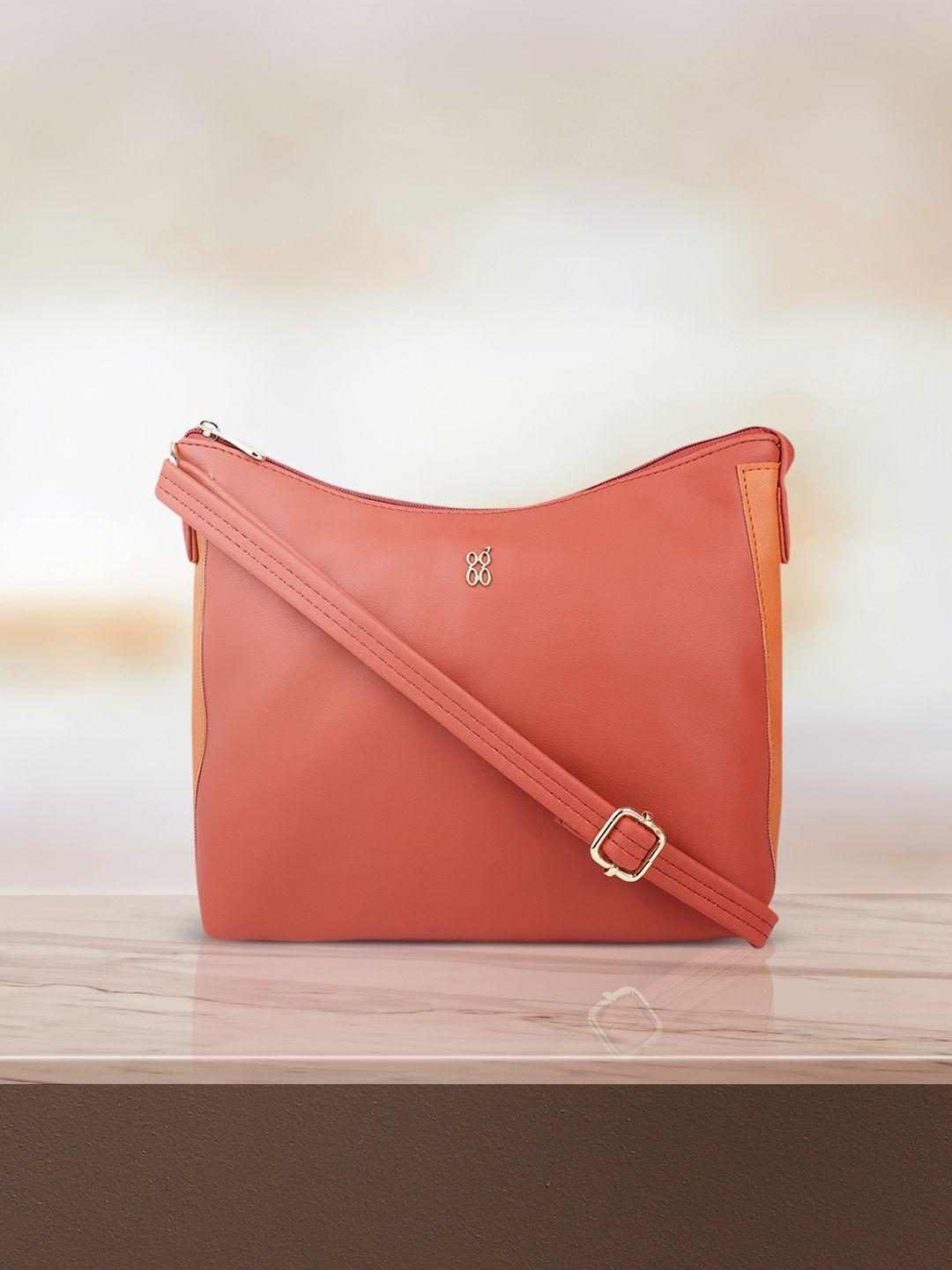 baggit women rust solid structured sling bag