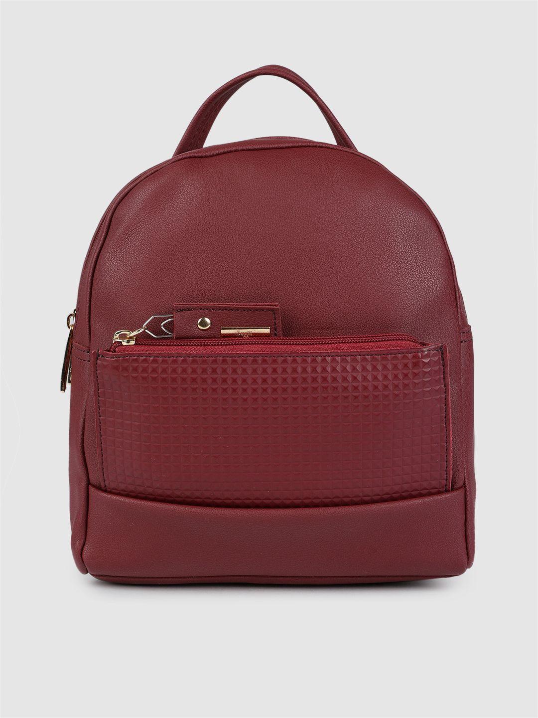 baggit women solid maroon backpack