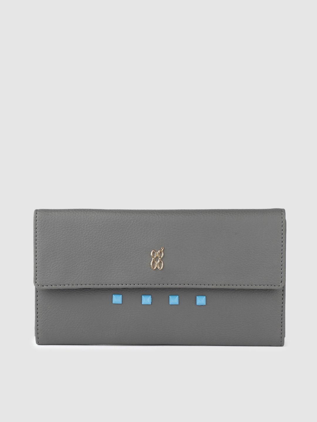 baggit women solid pu three fold wallet with sim card holder & minimal embellished detail
