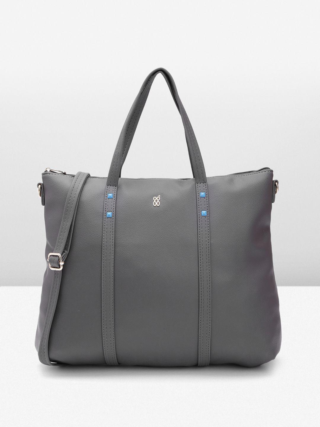 baggit women textured laptop bag