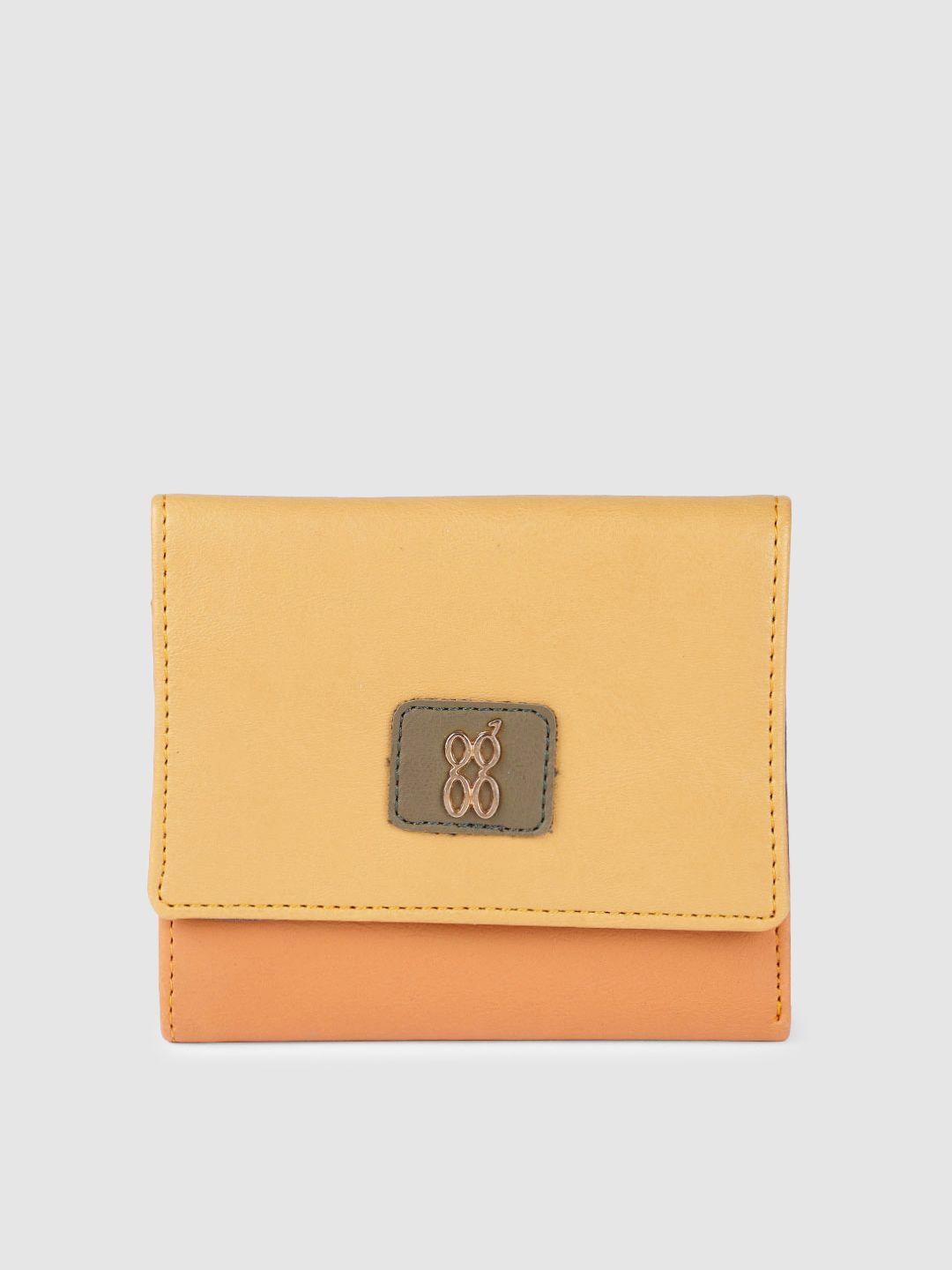 baggit women yellow & orange solid synthetic three fold wallet