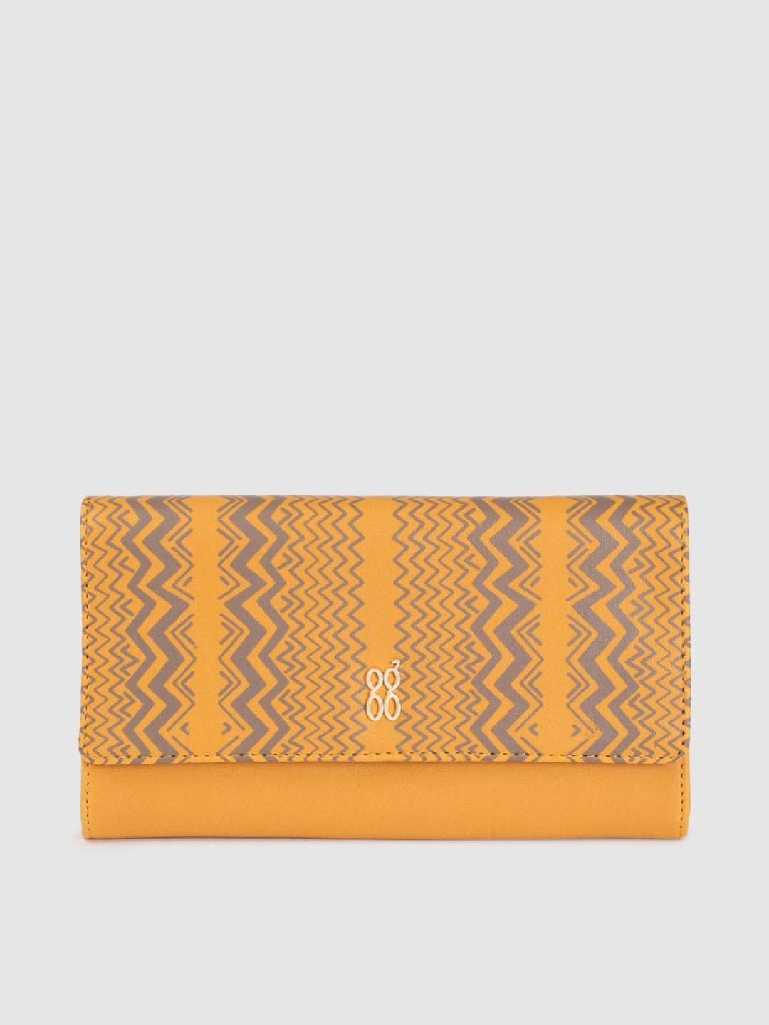 baggit women yellow geometric printed three fold wallet