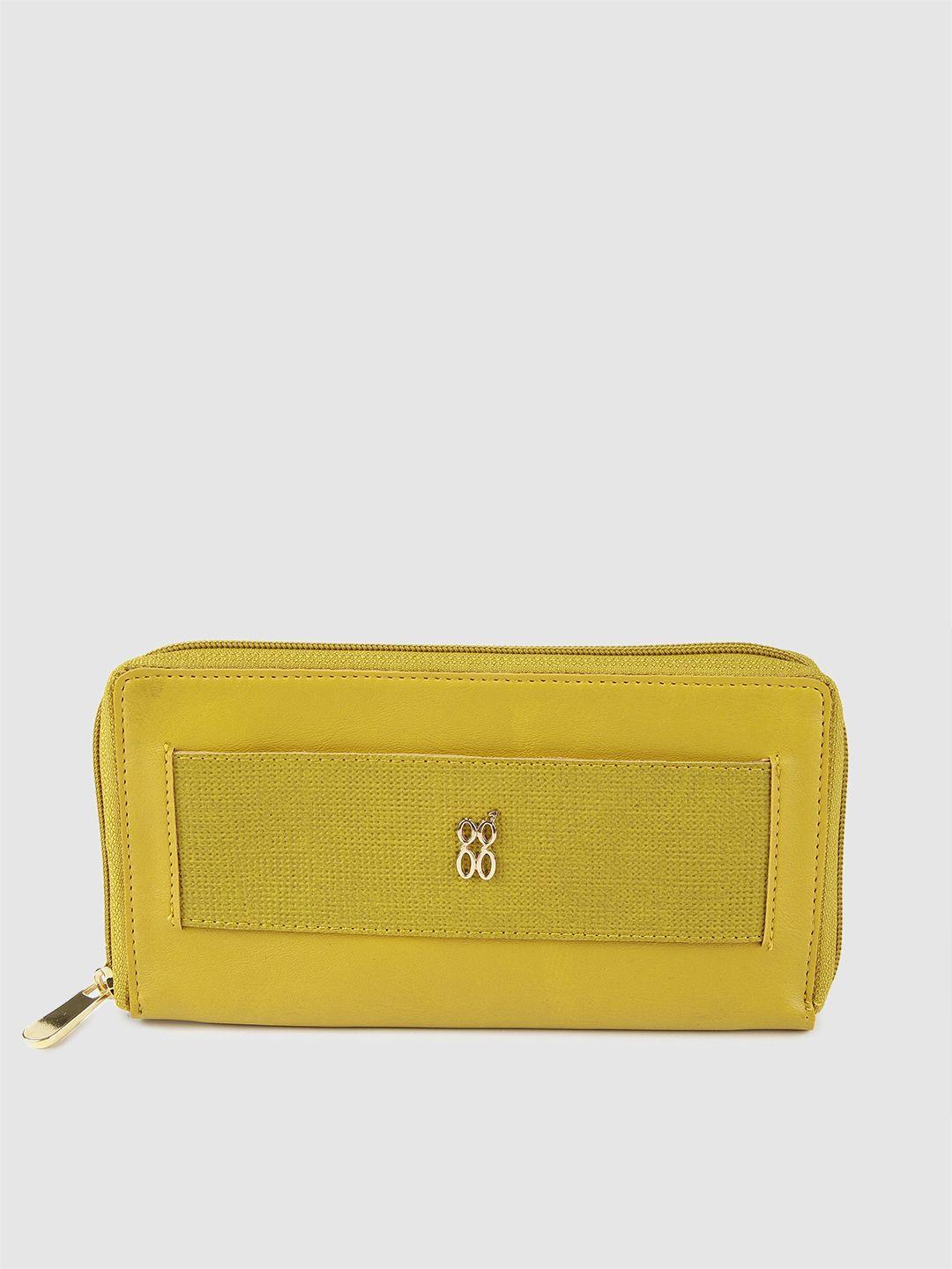 baggit women yellow lerry e ashlyn solid zip around wallet