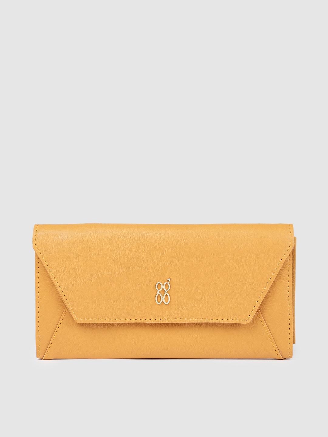 baggit women yellow solid two fold wallet