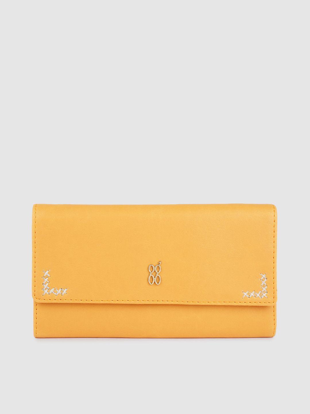 baggit women yellow solid two fold wallet