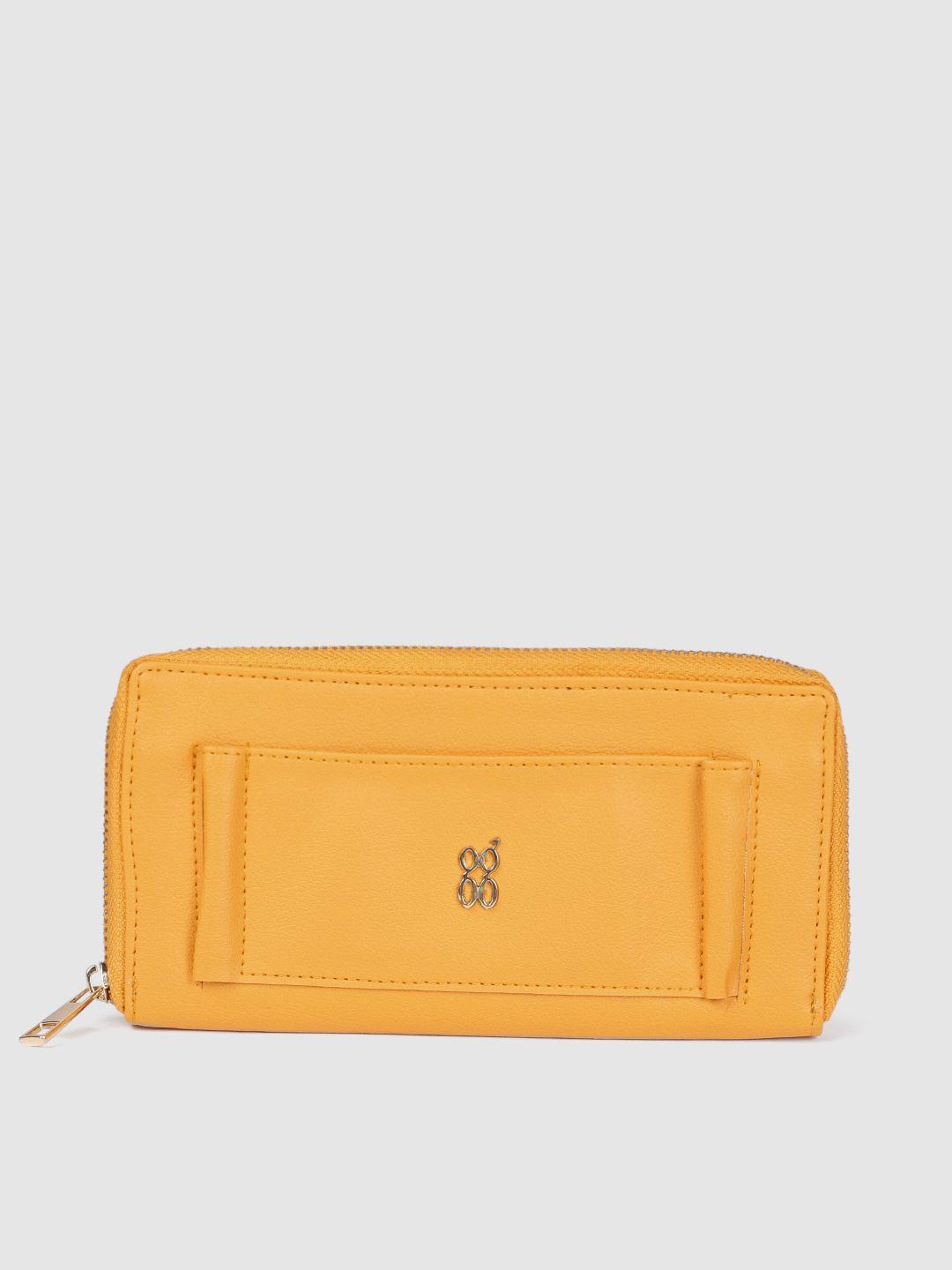 baggit women yellow solid zip around wallet