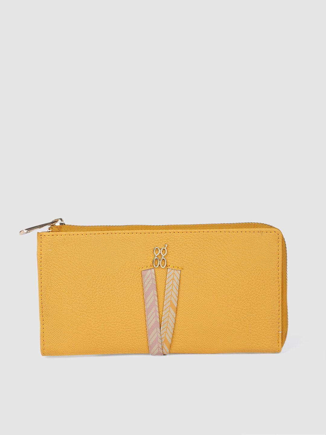 baggit women yellow solid zip around wallet
