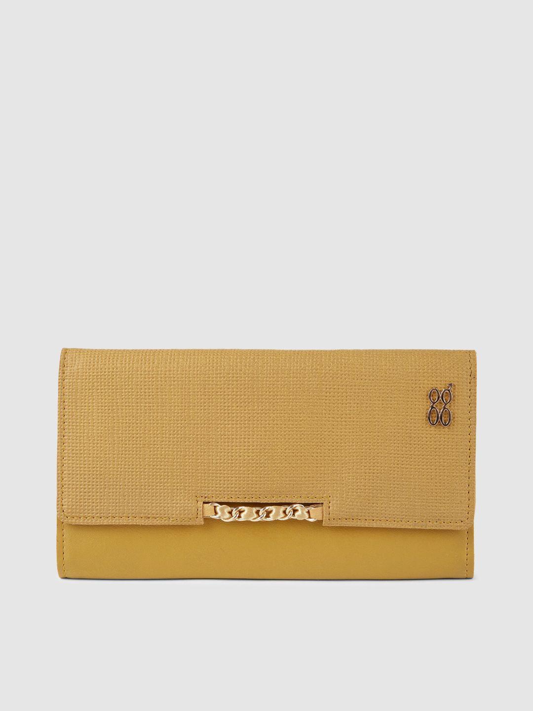 baggit women yellow textured three fold wallet