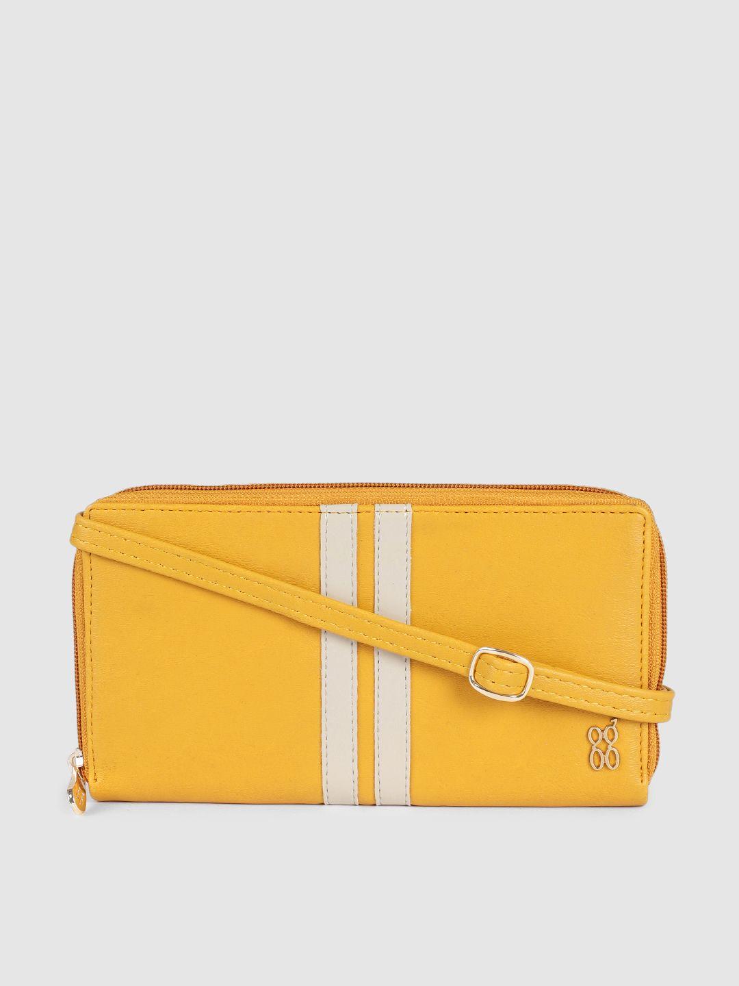 baggit women yellow zip around wallet