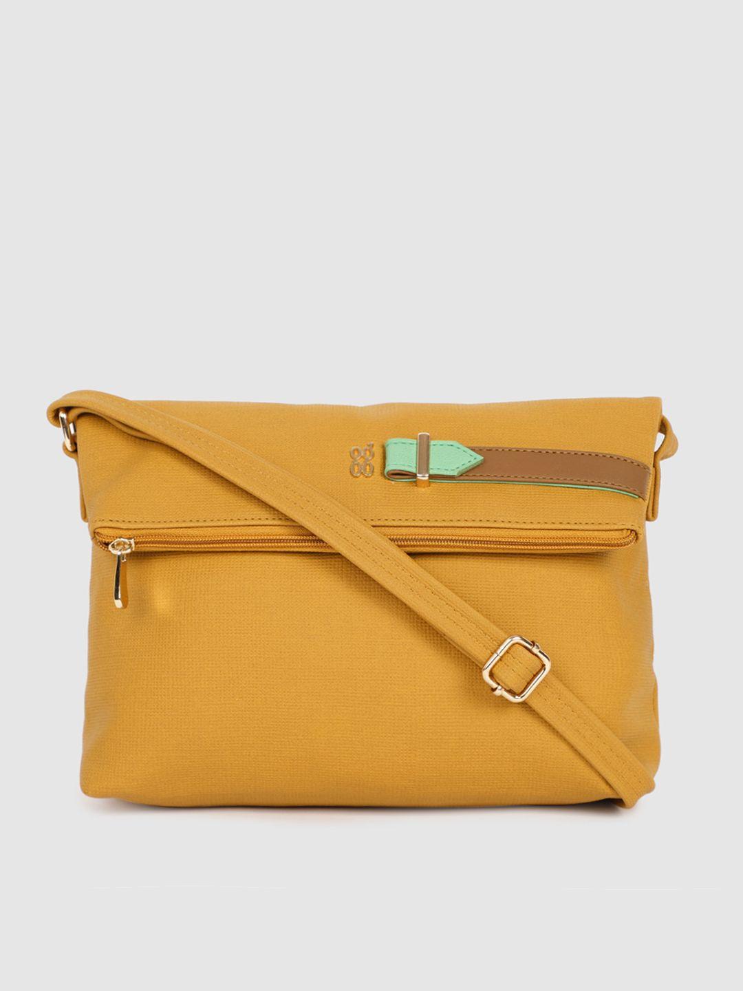 baggit yellow solid snowdrop e brodey sling bag