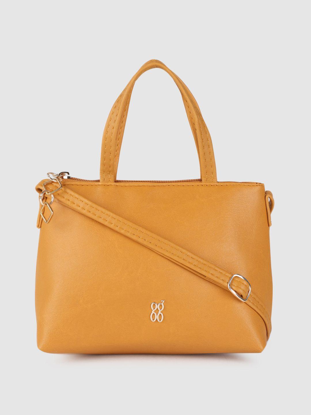 baggit yellow solid structured handheld bag