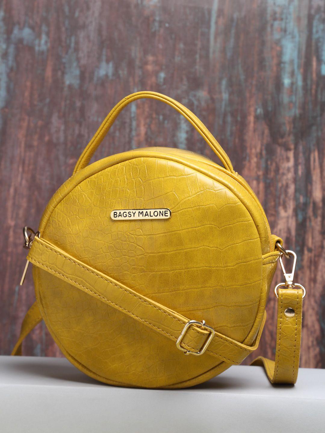 bagsy malone yellow pu structured handheld bag with tasselled