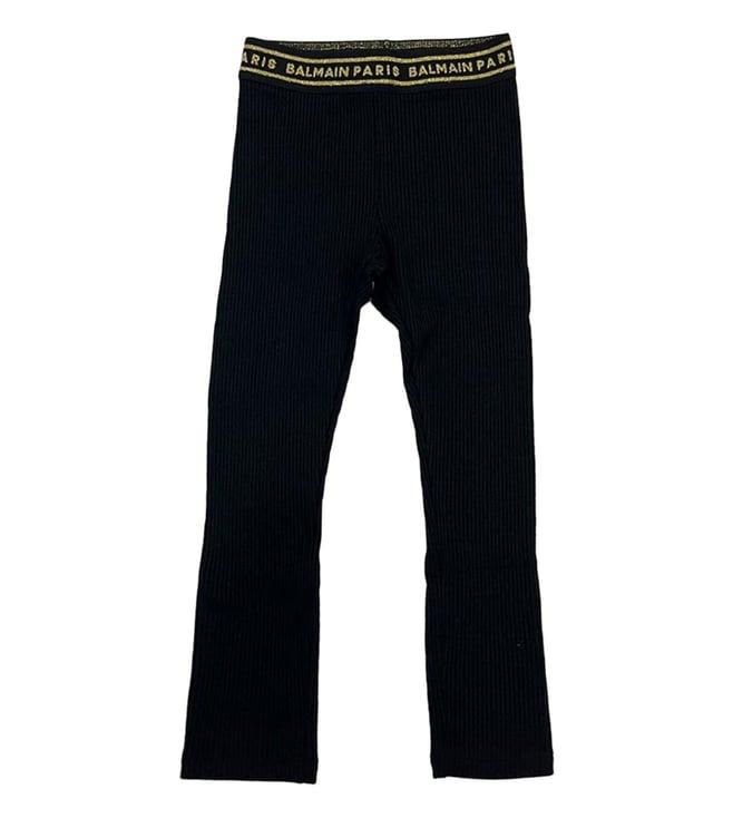 balmain kids black solid flared fit trousers