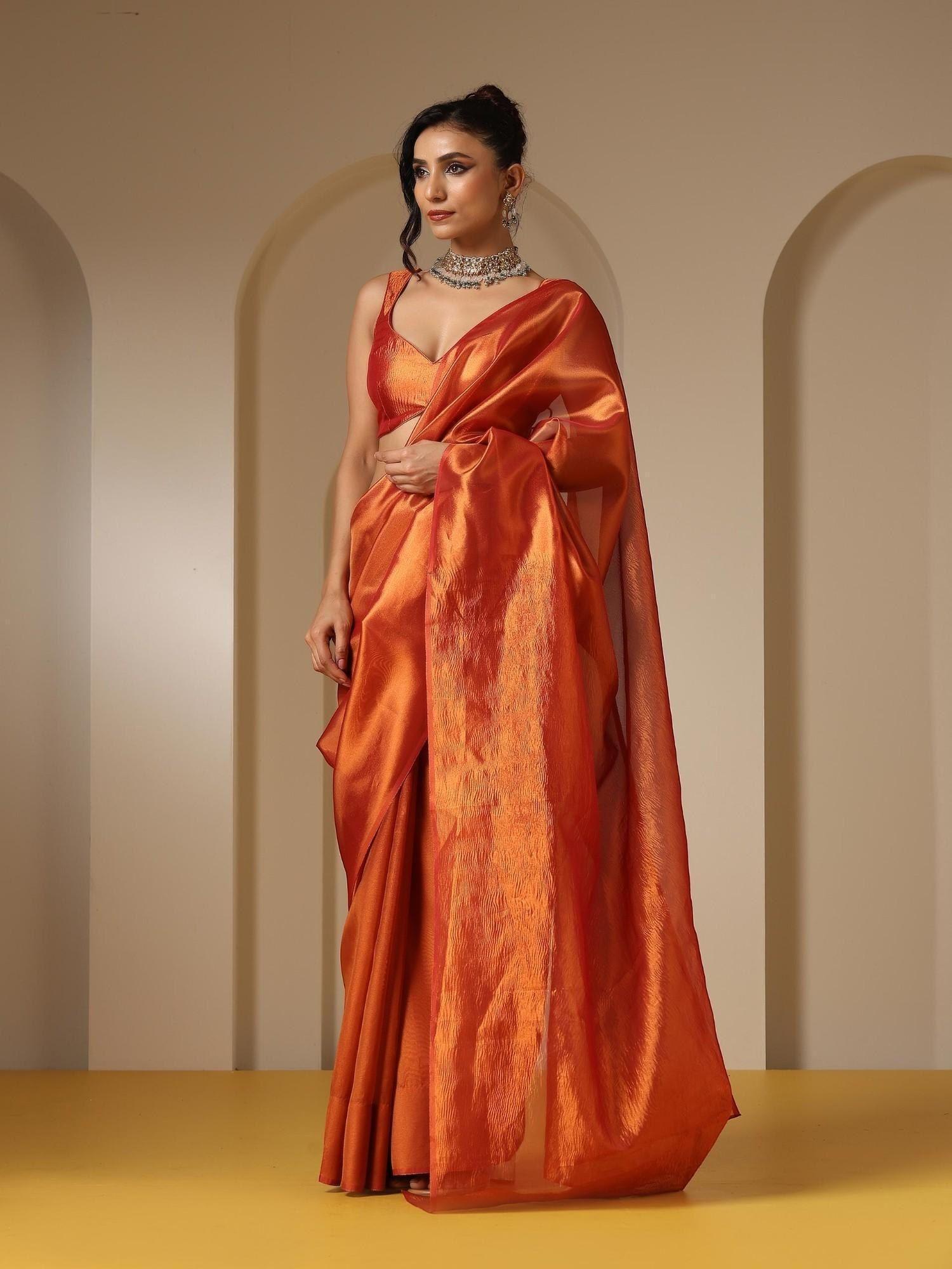 banarasi red orange saree with crushed pallu and fabric with unstitched blouse