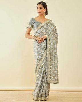 bandhani print saree with contrast border