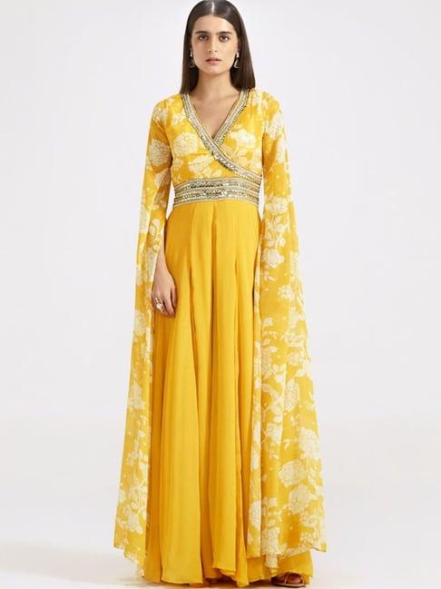 basanti kapde aur koffee yellow jumpsuit with cape sleeves