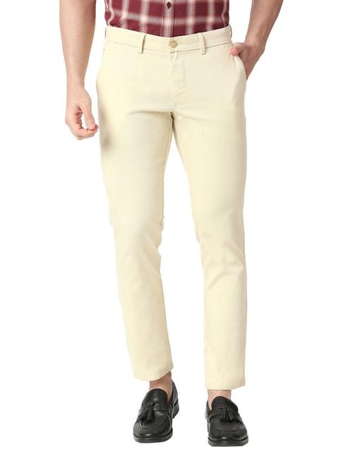 basics beige tapered fit self pattern trousers