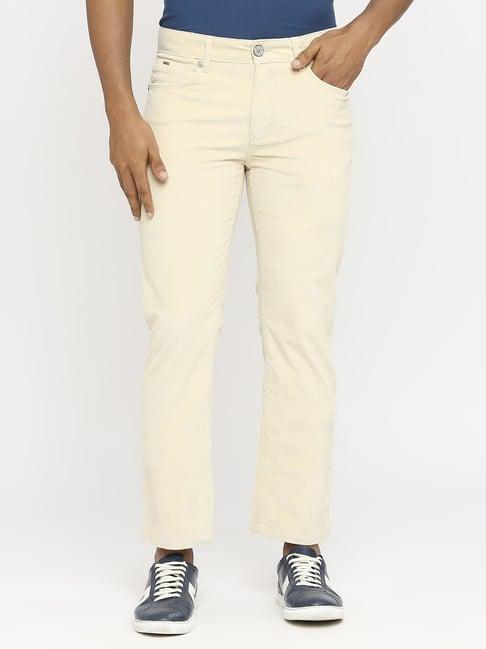 basics beige cotton tapered fit texture trousers