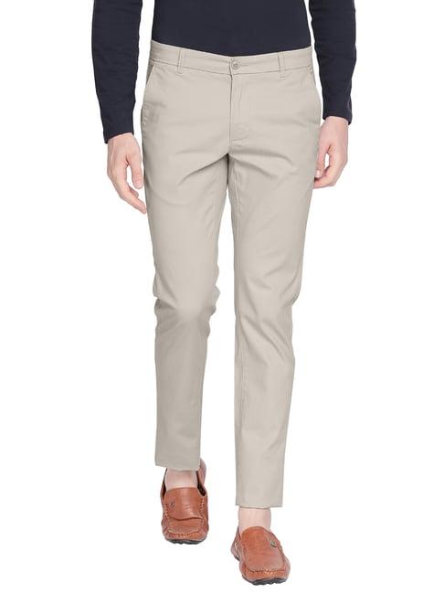 basics beige tapered fit trousers