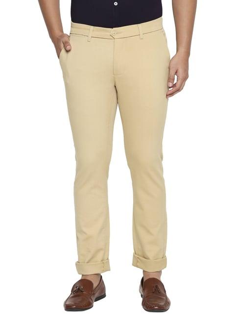 basics beige tapered fit trousers