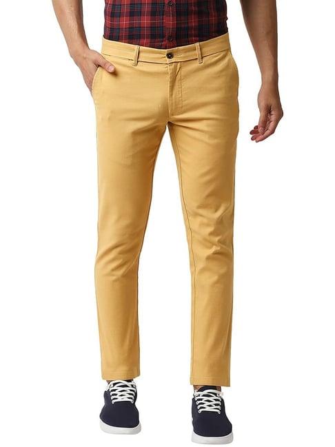 basics golden cream mustard cotton tapered fit trousers