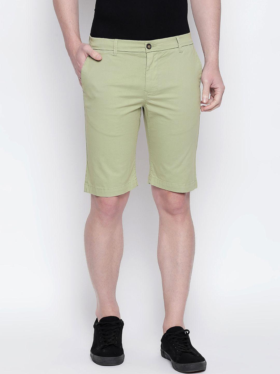 basics men green solid regular fit regular shorts