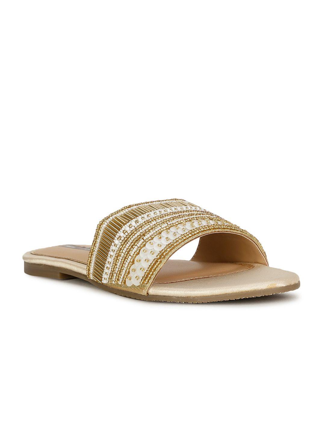 bata gold coloured embellished open toe flats