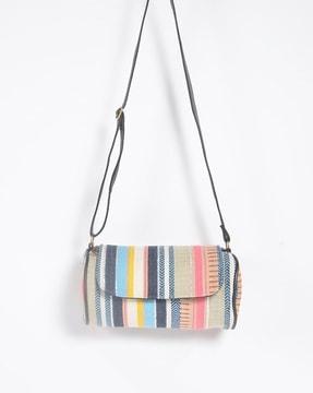 beachy woven cylindrical sling bag